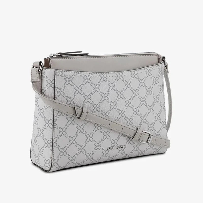 CARTERA NINE WEST DOVE LOGO